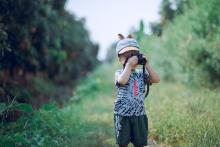 Dítě s fotoaparátem